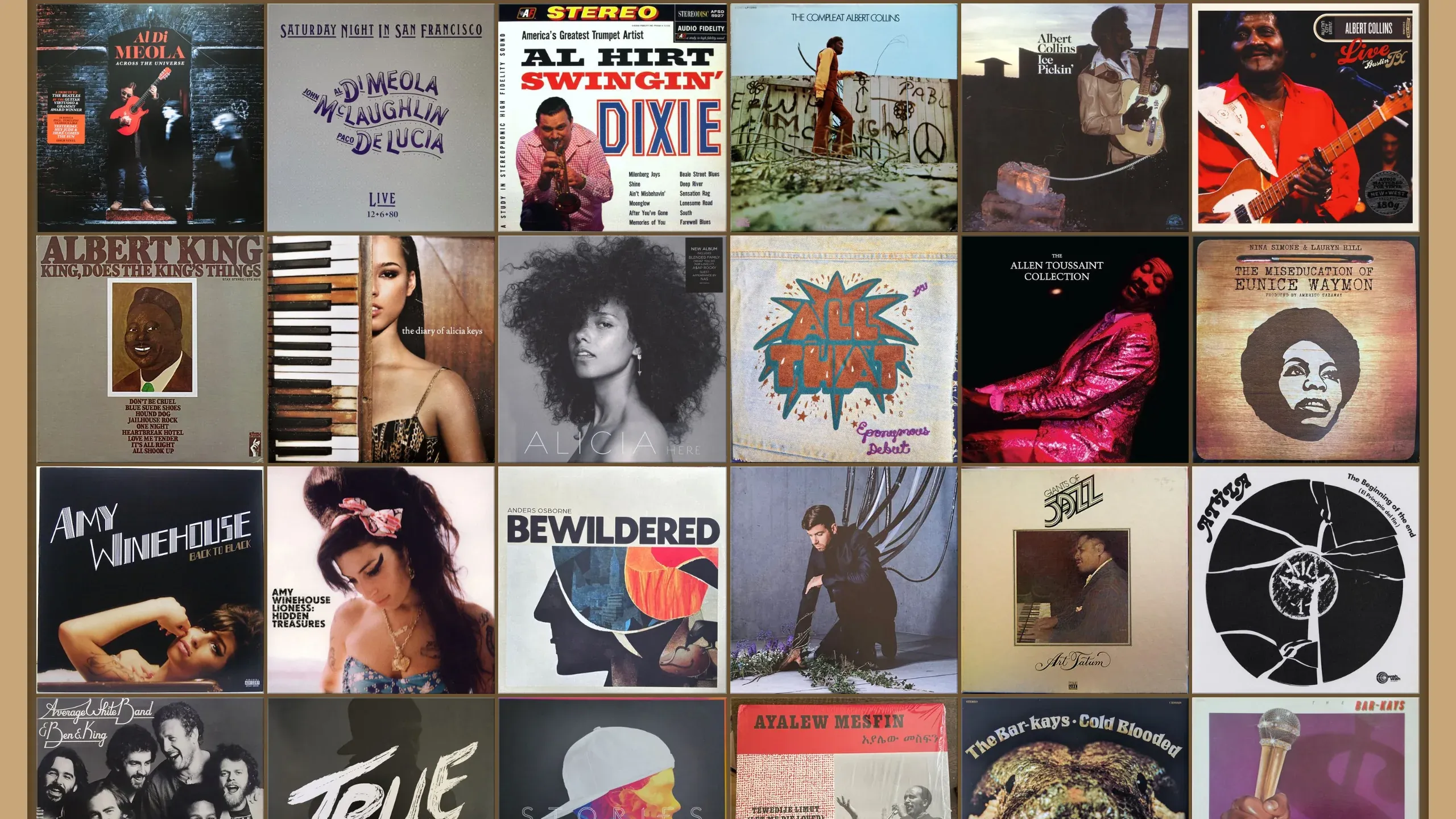 A wall of album covers, edge to edge, on the demo shelf